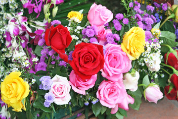 Colorful bouquet of roses on background