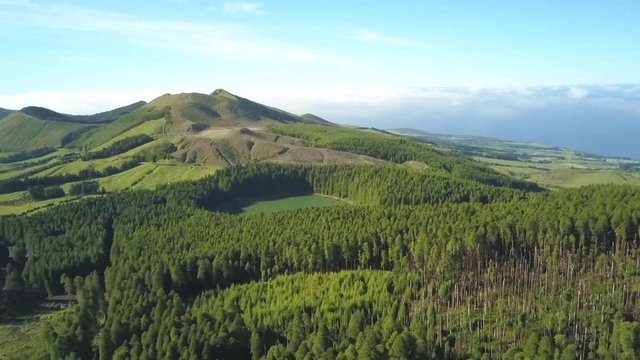 azores landscape in sao miguel island - flying over the trees and the lake