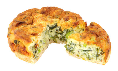 Crustless spinach and kale quiche isolated on a white background