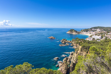 Fototapeta na wymiar Spanish mediterranean coast at the Costa Brava with village Tossa de Mar and his medieval castle