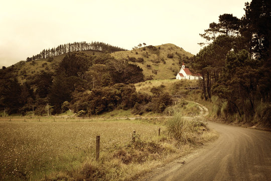 Country School House Nestled in Tree Lined Hills