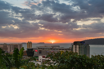 The city sunset over the sea.