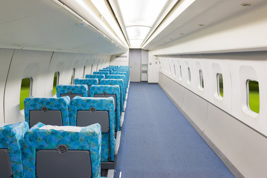Interior of electric train with empty seats business transportation  background.