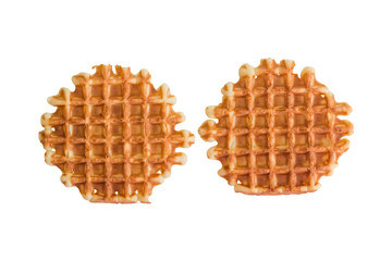 Soft waffles, sweet pastries, isolated on white background, close - up, top view
