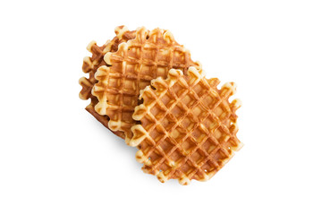 Soft waffles, sweet pastries, isolated on white background, close - up, top view
