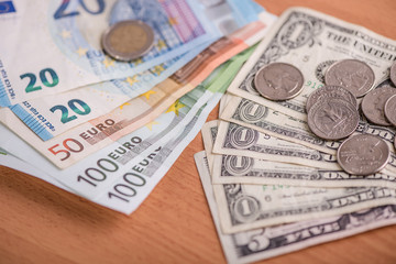 euro paper bank notes against american dollar currency