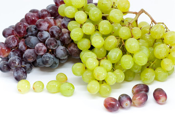 white and black grapes on white background