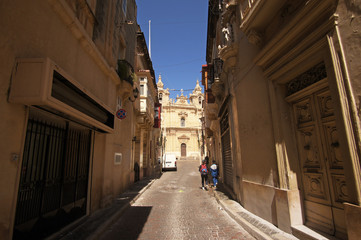Street leading to Saint Helen Collegiate Basilica in Birkirkara (B'kara), Malta