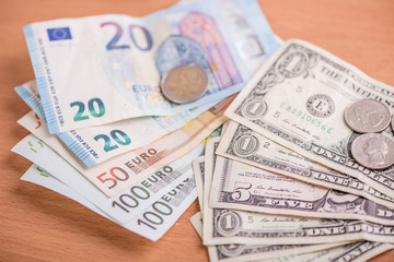 euro paper bank notes against american dollar currency