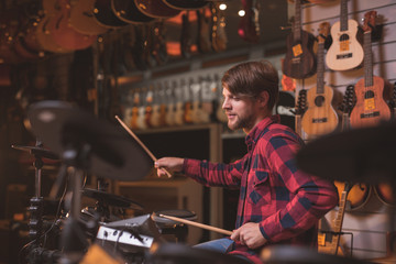 Young man playing the drums
