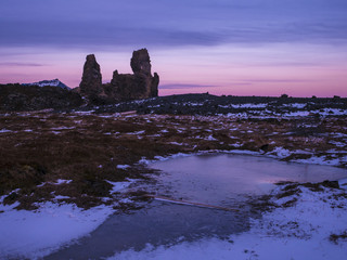 Fototapeta na wymiar Sunset colour Ice and Rocks