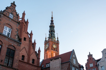 Photo of the old town of Gdansk architecture in sunset light. Aerial shot. Channel and buildings - top view