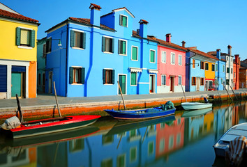 Fototapeta na wymiar Burano and reflection in the water with Effect with long exposure