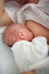 Breastfeeding of little baby