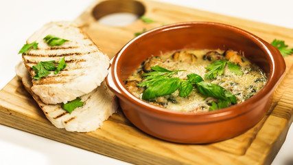 Authentic Thai-style noodle soup with fishballs, squids, crispy wonton and special homemade red sauce