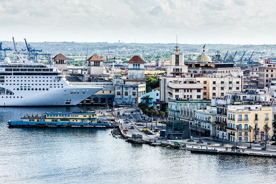 City Panorama And Big Cruise Ship Docked In Port Of Old Havana, Cuba