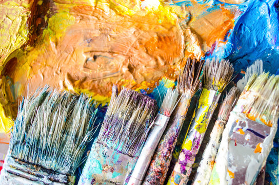 Artist paint brushes and palette