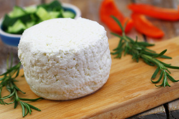 Traditional Polish curd cheese on wooden board

