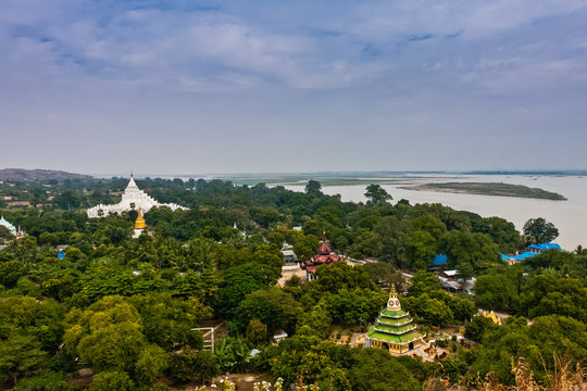 A scenic view of the Hsinbyume Pagoda and Irrawaddy River from the Mingun Stupa, Mandalay, Myanmar