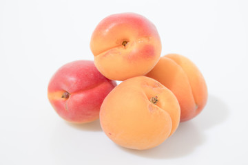 Fruit composition, apricots isolated in a white background