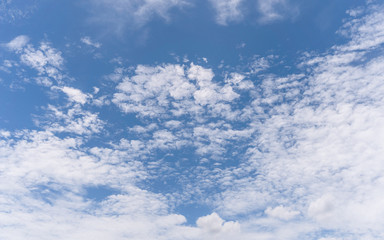 Naklejka premium Blue sky background with clouds