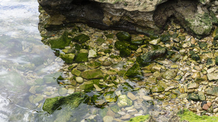 Clear and crystalline sea with rocks