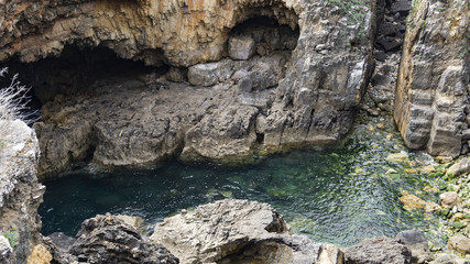 Clear and crystalline sea with rocks