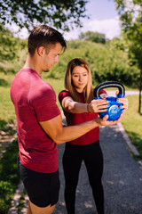 Young fitness couple outdoor exercise