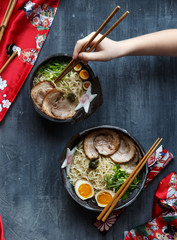 Japanese ramen soup with pork, egg and chives