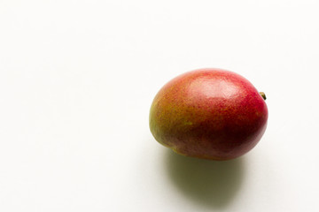 fresh ripe mango on white background
