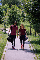 Fototapeta premium Young fitness couple outdoor exercise