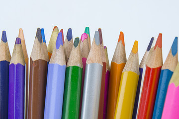 Fototapeta premium multi-colored pencils rainbow colors office background