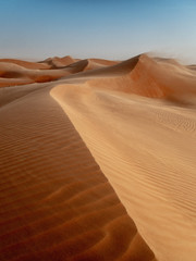 The dunes of the Wahiba Sands desert in Oman at sunset during a typical summer sand storm - 10