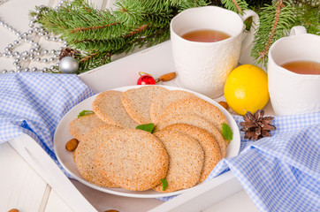 crispy vanilla almond cookies on a plate