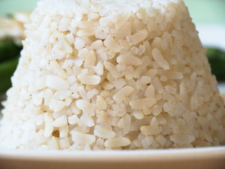 Chicken breast stuffed with asparagus in creamy sun-dried tomato sauce served with rice