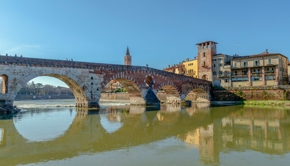 View of medieval bridge of Ponte Scaligero, near Castelvecchio, Verona, Italy