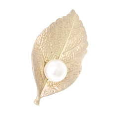 golden brooch leaf with pearl isolated on white