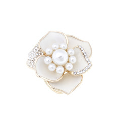 gold brooch flower with a pearls and diamonds isolated on white