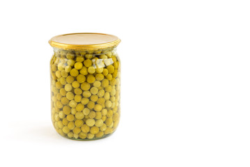 Homemade pickled peas in glass jar isolated on white background.