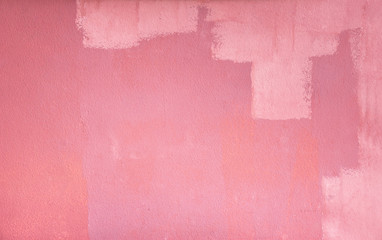 grunge brush painted pink cement wall background