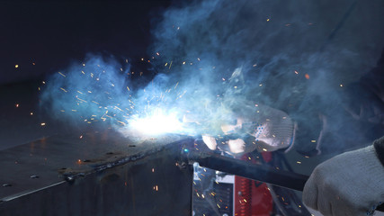 electric welding, sparks and fire close-up