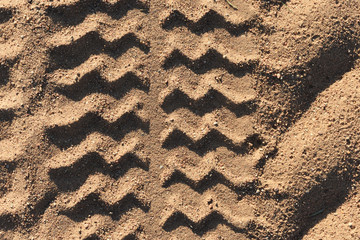 tractor tracks on the sand
