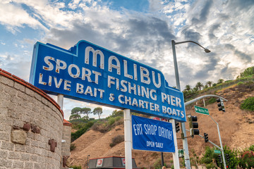 MALIBU, CA - AUGUST 1, 2017: Malibu fishing pier entrance. This is a major attraction for tourists - obrazy, fototapety, plakaty