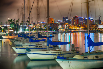 San Diego beautiful night skyline from city port. Boats and buildings