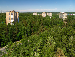 Top view of house in forest in Moscow, Russia.