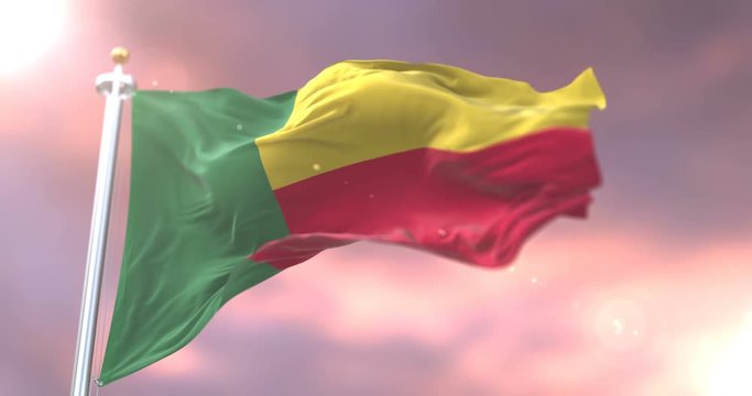 Benin flag waving at wind in slow at sunset, loop