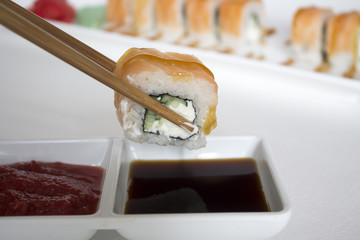 sushi rolls with sticks seafood