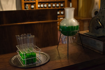 A green potion being brewed in an old pharmacy 