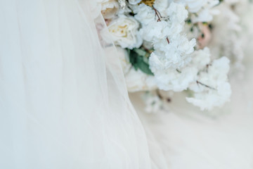 Beautiful flower arrangement on white textile background