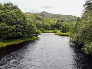 Fototapeta na wymiar River flowing throughout a valley
